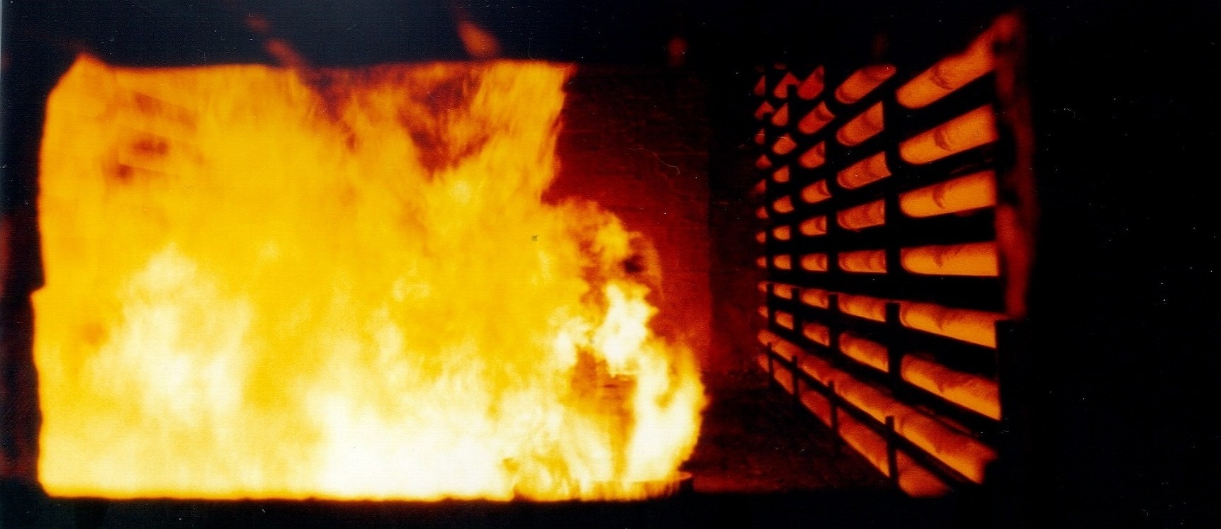 Inside Cabin Fired Heater, Inside Heater, Inside Furnace, Inside API 560 Cabin Heater, Cabin Heater with Horizontal Tubes, Burners Firing Inside Fired Heater, Burner Flames Inside Fired Heater
